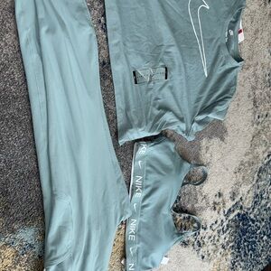 Nike Teal Activewear 3 piece sports bra , t shirt and leggings.